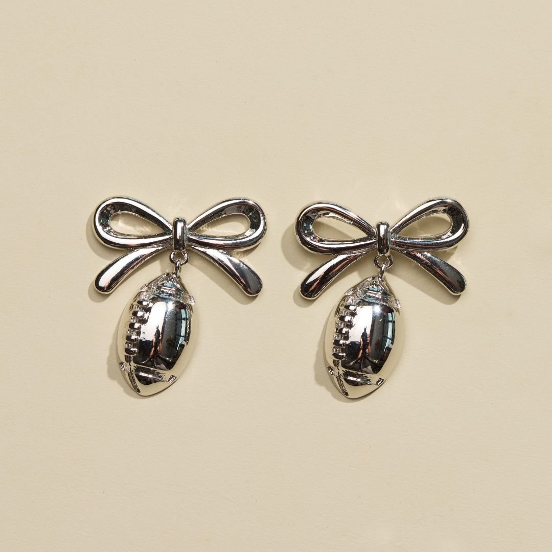 Silver Waterproof Football & Bow Stud Earrings