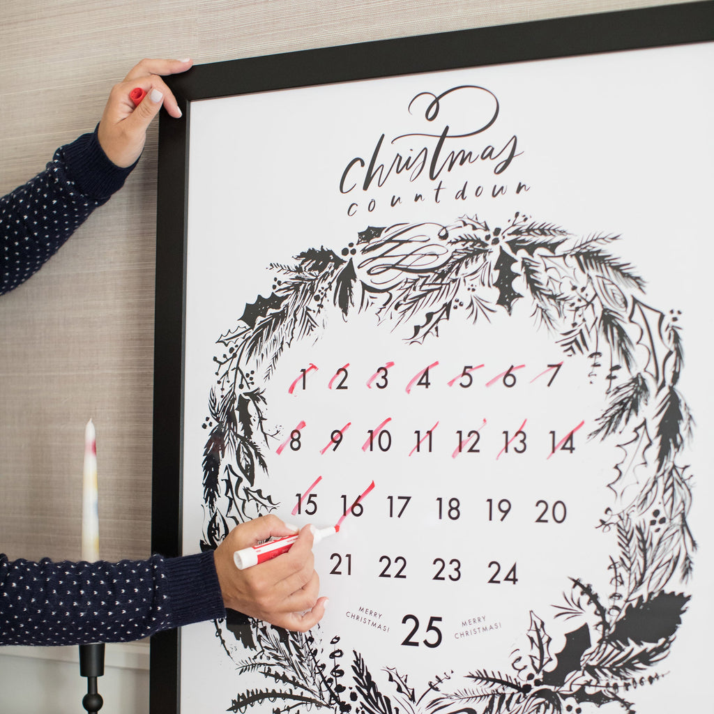 details of classic christmas calendar framed in classic black, size 24 x 30