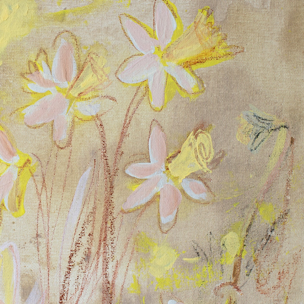 daffodils on straw canvas