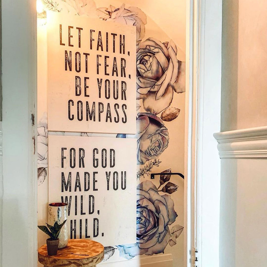 let faith be your compass & for god make you wild unframed canvases in alabaster, each sized 24 x 30. image courtesy of @kindredvintage.