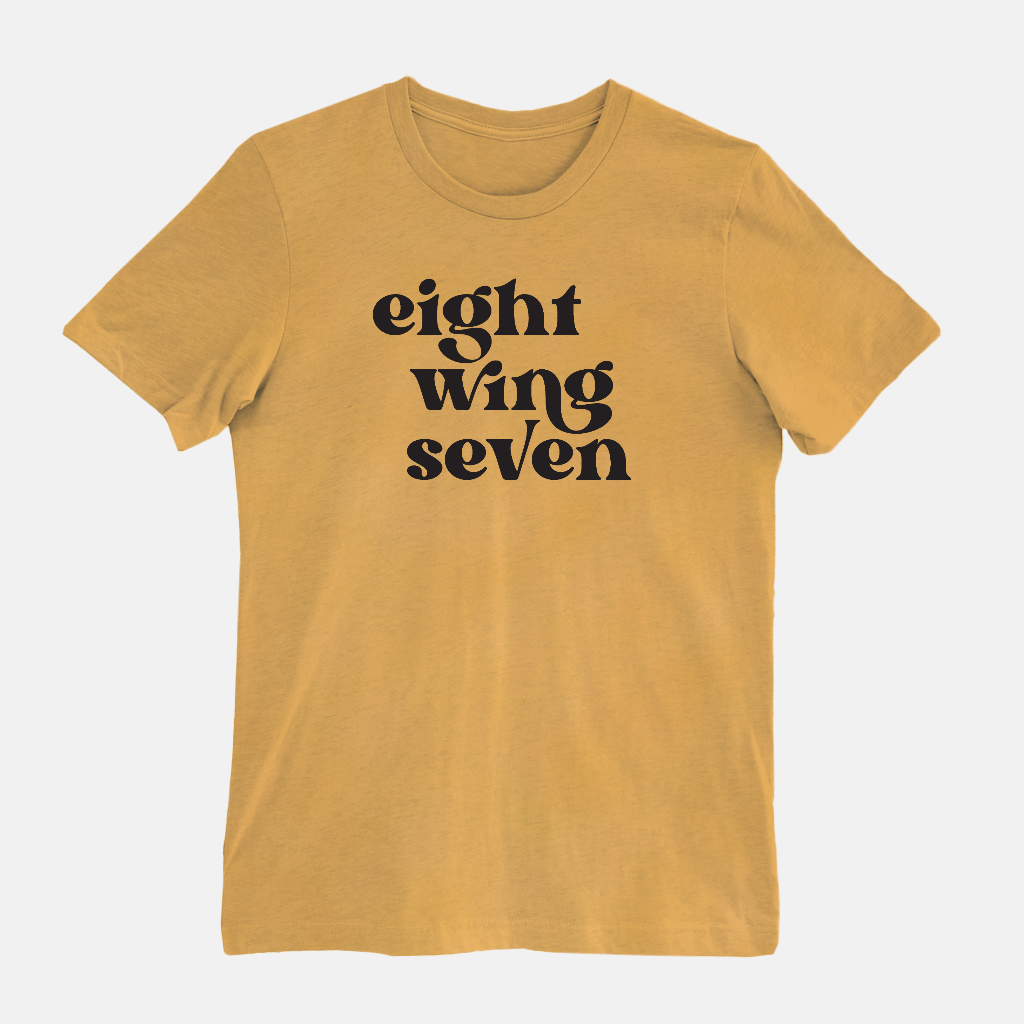 enneagram number typography in heather mustard, eight wing seven