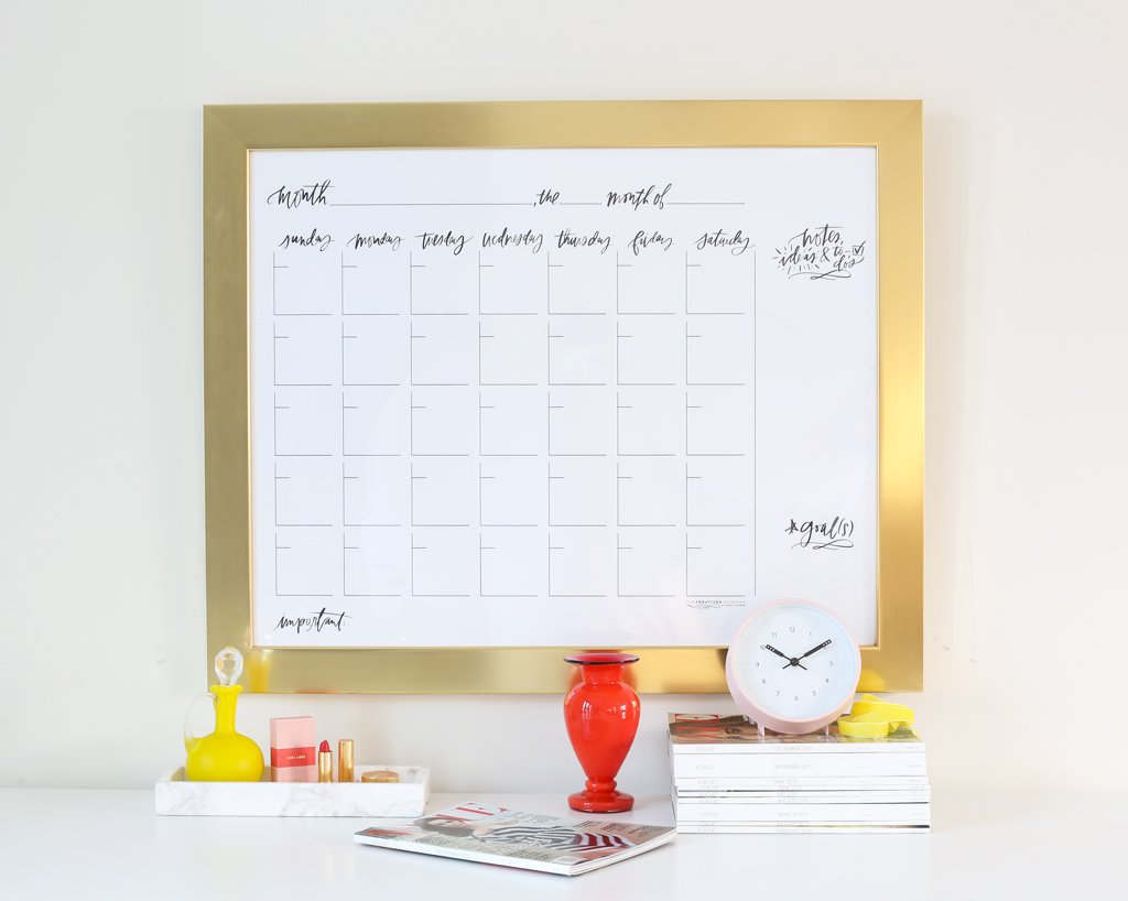 the original monthly wall calendar with modern gold frame, size 30 x 24
