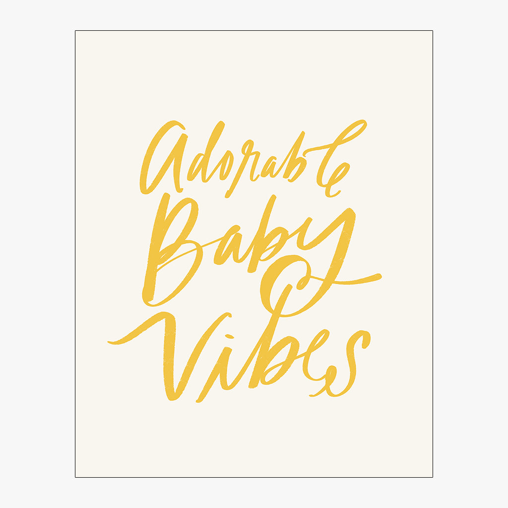 adorable baby vibes download with honey lettering on alabaster background