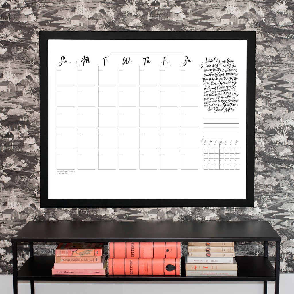 now & next horizontal creatives calendar framed in classic black, size 36 x 29