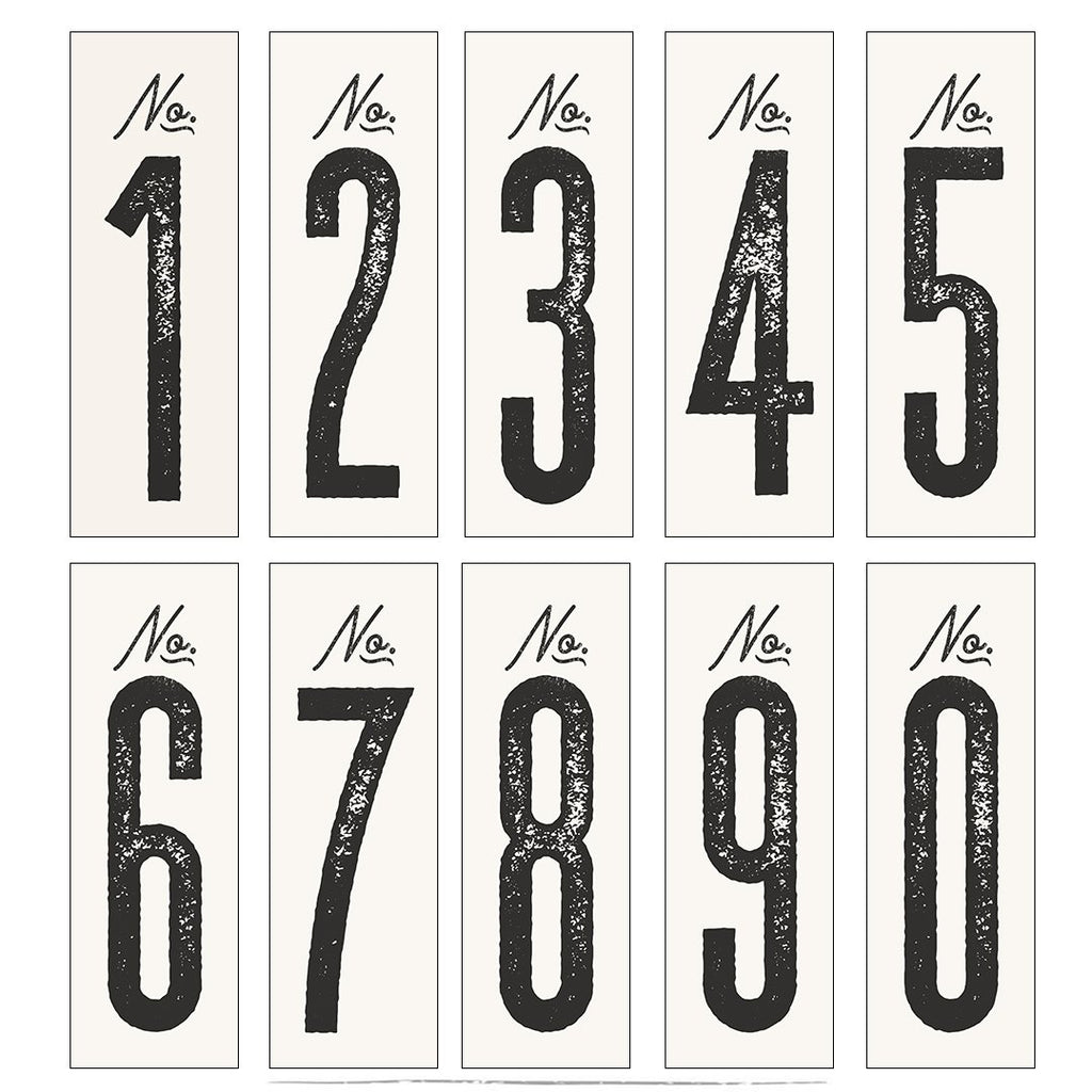 design of the vintage signage numbers in alabaster with soft black text