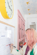 Lindsay writing on the Typography Perpetual calendar