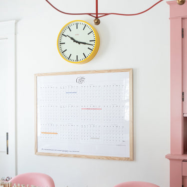 The Typography Perpetual calendar framed in natural wood, size 42x34